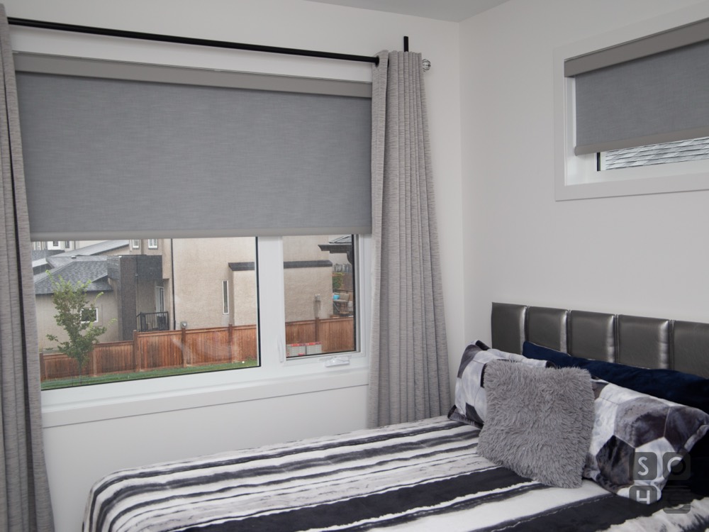Bedrooms: custom roller shades for full privacy